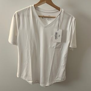 ZYIA Active White Go To Pocket V-Neck NWT